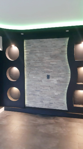 Odaymo schilder en decoratiewerk kan een compleet wandmeubel voor u maken, waarbij de tv wordt ingebouwd evenals een open haard.